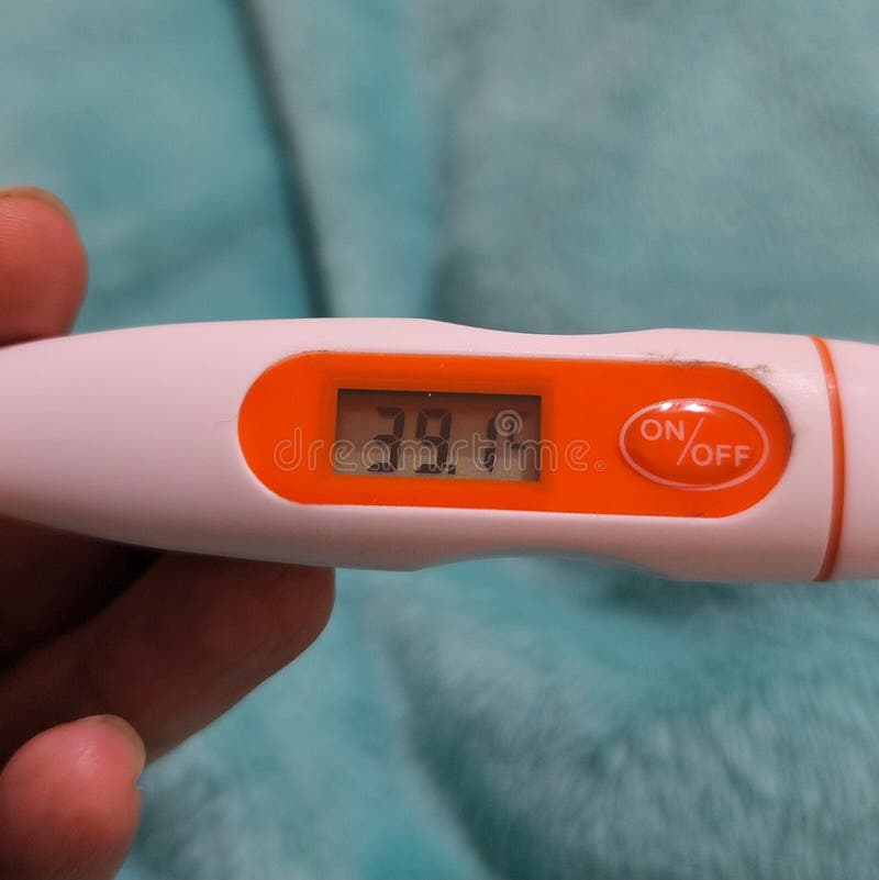 A Thermometer Shown the Result of Body Temperature Measure of 39 Degree