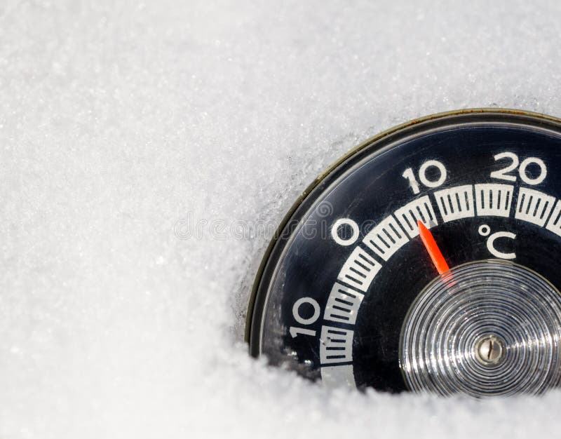 Thermometer in a snow warm winter weather global warming concept. Roung thermometer with celsius scale placed in a snow showing high temperature — warm winter stock photo Thermometer in a snow warm winter weather global warming concept. Roung thermometer with celsius scale placed in a snow showing high temperature — warm winter stock photo