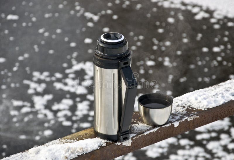 Thermos with hot tea stock image. Image of thermos, snow 18345151