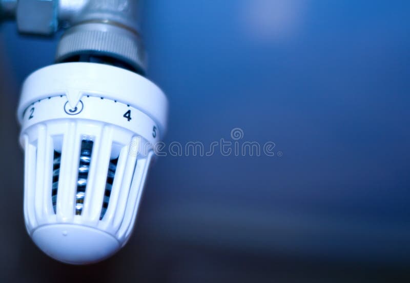 Thermostat - heat control device for winter time royalty free stock image