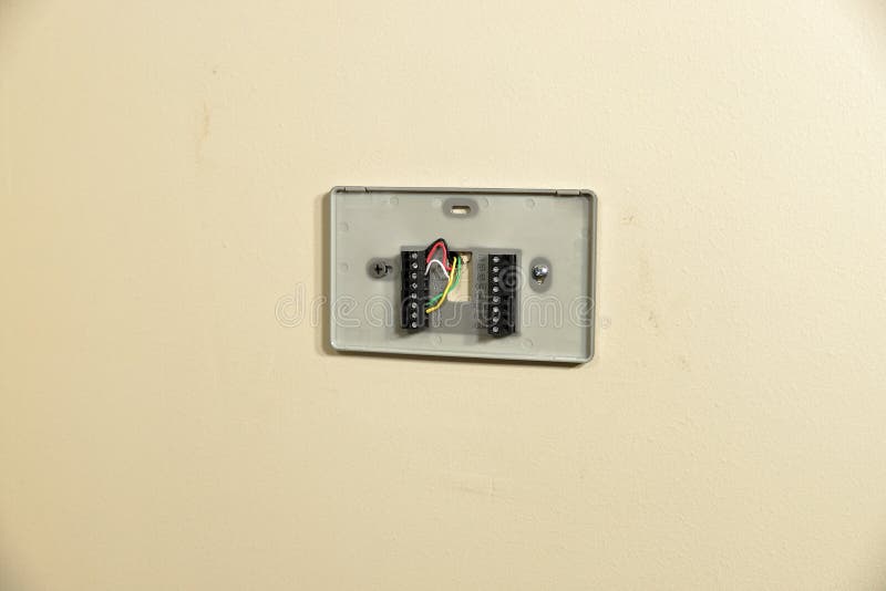 Thermostat Wiring Plate On Wall Stock Photo Image of panel, cooling