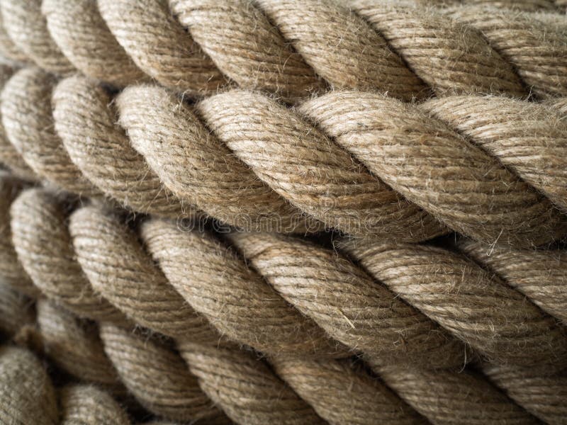 The thick rope twisted in a roll. A long rope for wide use royalty free stock image The thick rope twisted in a roll. A long rope for wide use royalty free stock image