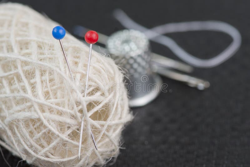 Thimble, Needle, Measuring Tape, Spool of Jute Thread and Pins. Items