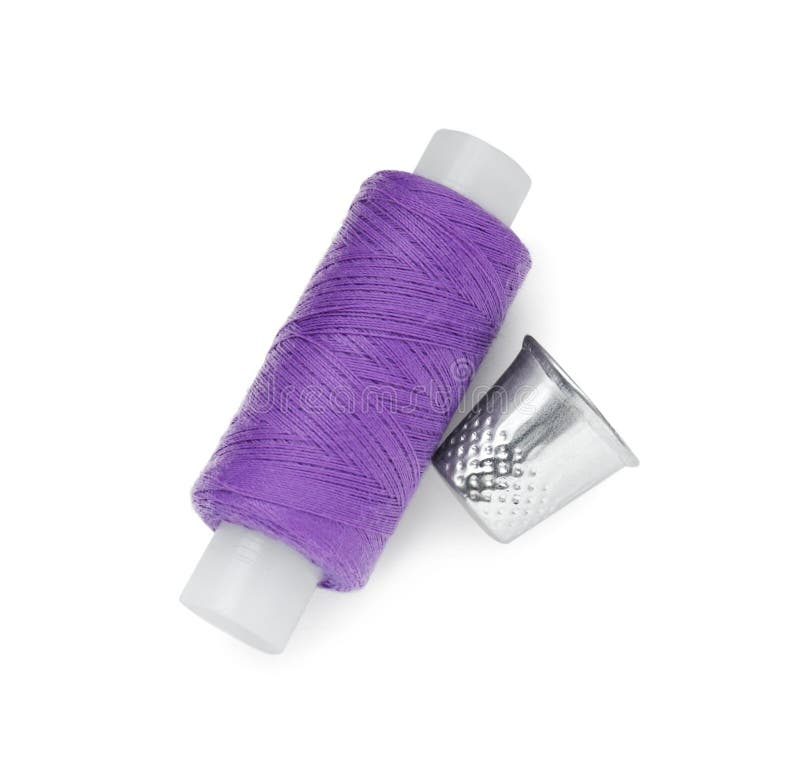 Thimble and Spool of Purple Sewing Thread Isolated on White, Top View ...