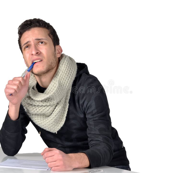 Thinking in an exam royalty free stock photography Thinking in an exam royalty free stock photography