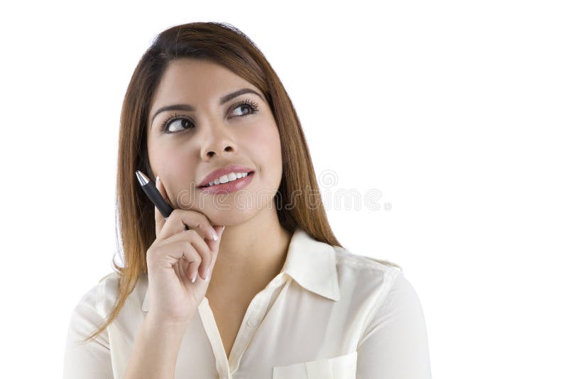 Thinking Hispanic woman holding a pen