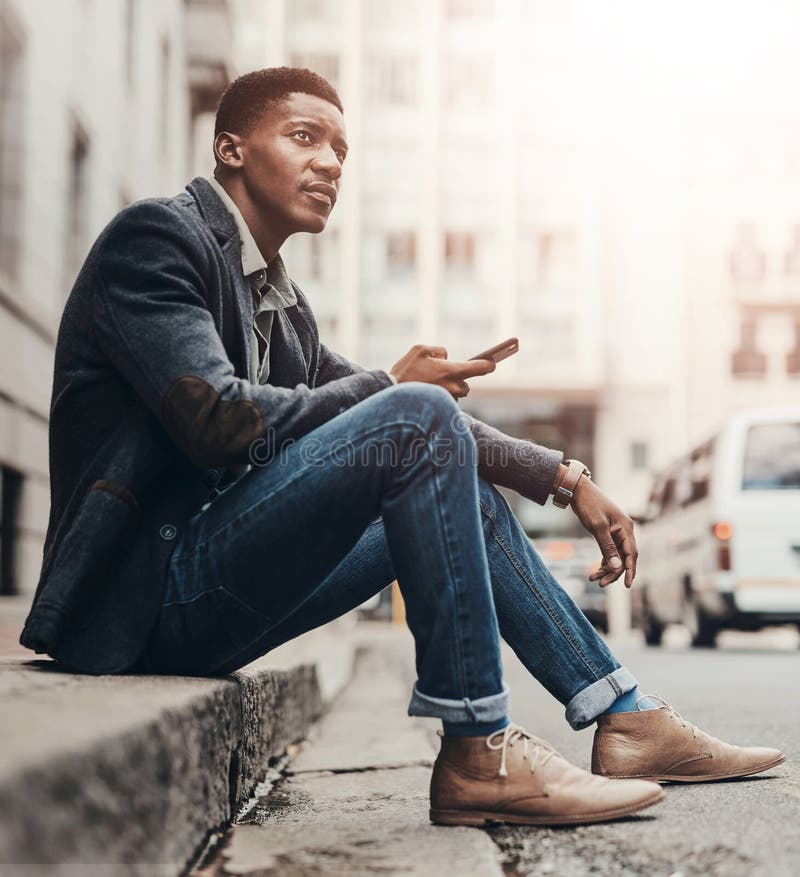 Thinking, phone and black man in city on street for navigation, digital map and direction on website. Travel, urban town stock photos