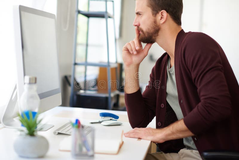 Thinking, writer and man in office on computer for copywriting, editing or creative agency for media. Startup, news research and journalist typing on pc for publication website or reading blog update. Editing project stock images, royalty-free photos and pictures