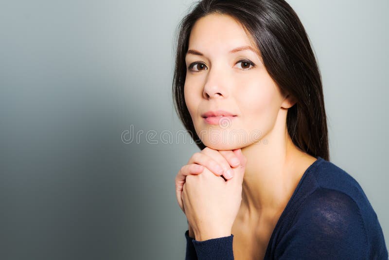 Thoughtful attractive woman with a serene face