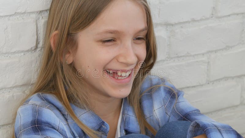 Thoughtful Child Portrait, Laughing Kid Face Looking in Camera Blonde Bored Girl stock photography Thoughtful Child Portrait, Laughing Kid Face Looking in Camera Blonde Bored Girl stock photography
