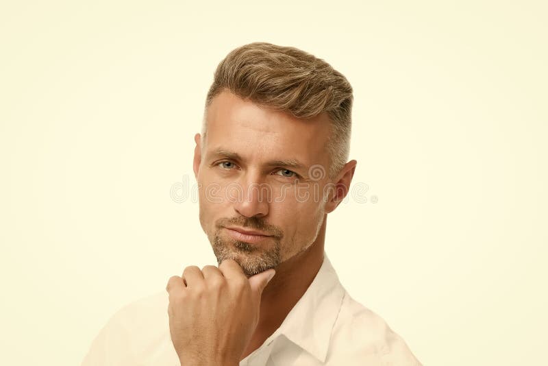 Thoughtful face expression. Grizzle hair suits him. Man handsome well groomed facial hair. Barber shop concept. Barber. And hairdresser. Man mature good looking stock image Thoughtful face expression. Grizzle hair suits him. Man handsome well groomed facial hair. Barber shop concept. Barber. And hairdresser. Man mature good looking stock image