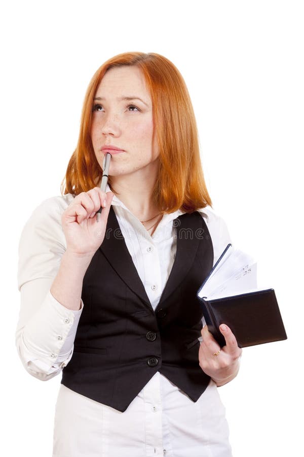 Thoughtful girl with diary