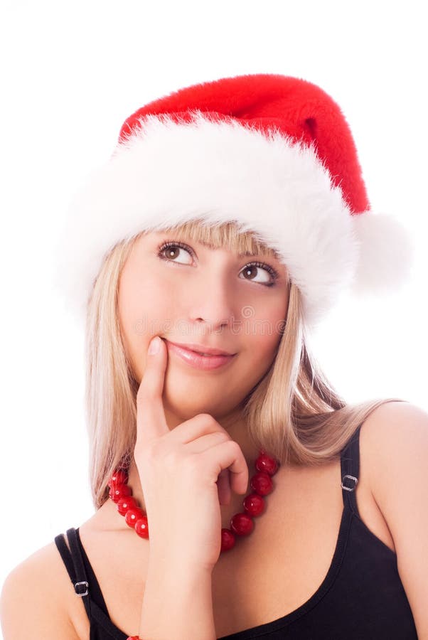 Thoughtful girl wearing Santa s hat