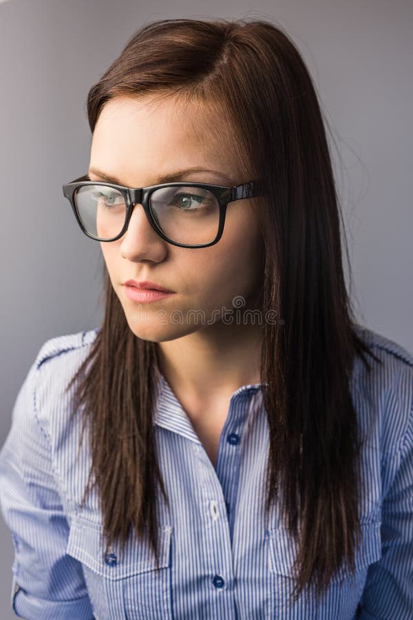 Thoughtful Pretty Brunette Wearing Glasses Posing Stock Image Image