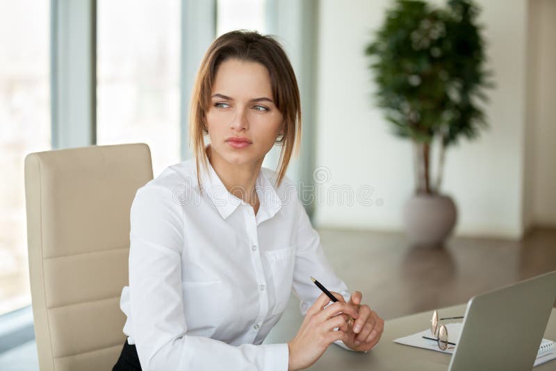 Thoughtful serious businesswoman thinking of problem feeling lac