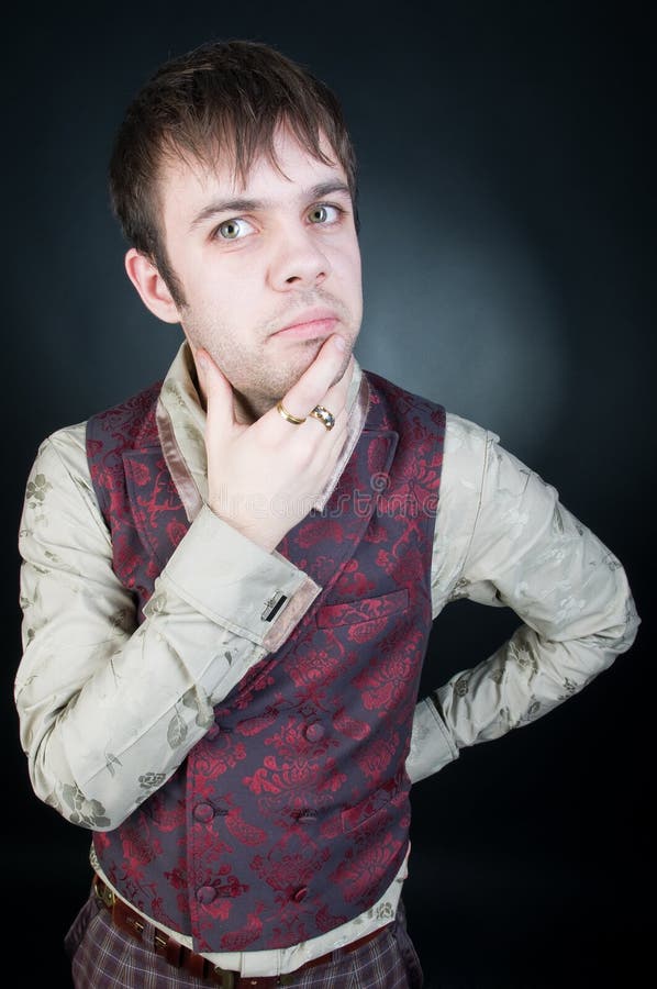 Thoughtful stylish man in vest