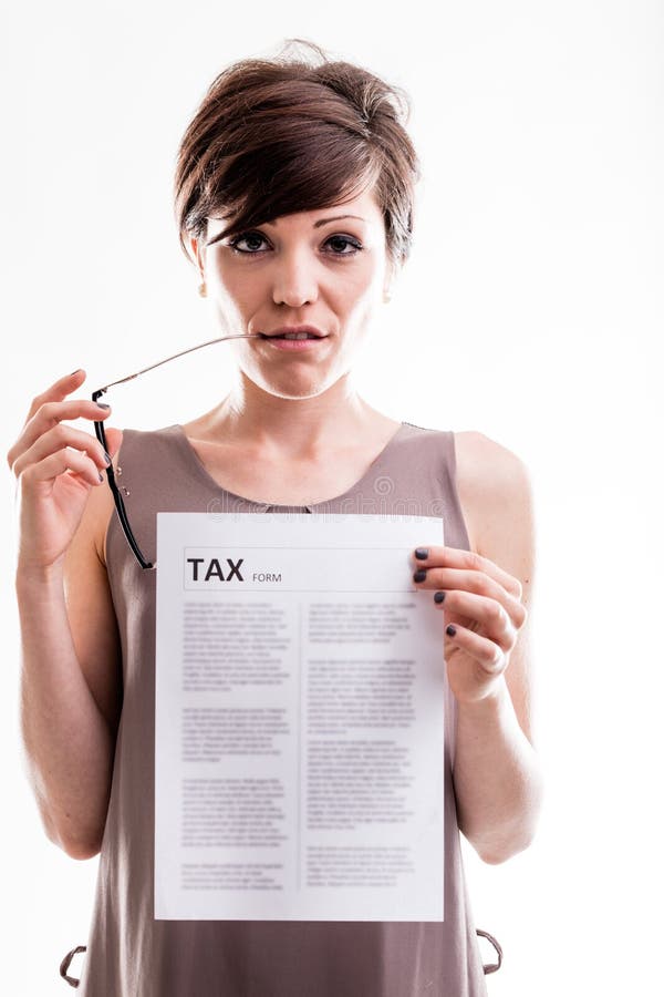 Thoughtful Woman Holding A Tax Document Stock Image Image Of Concept