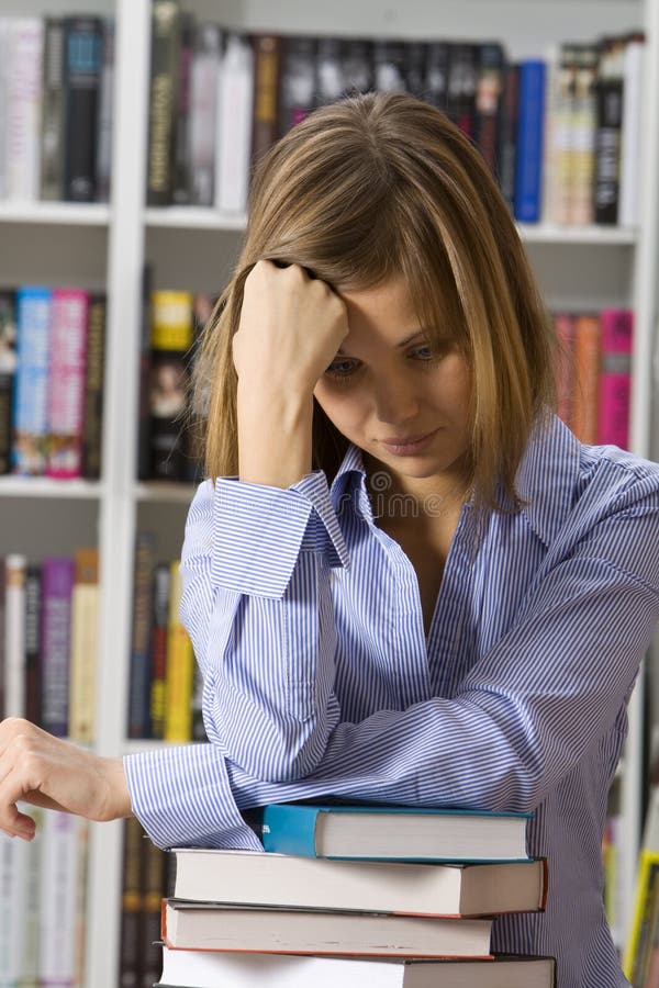 The thoughtful woman in the library