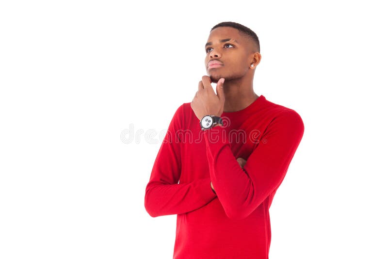 Thoughtful young african american man looking up