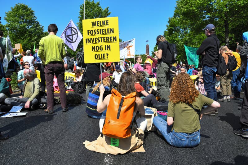 Thousands of Extinction rebellion activists protesting by blocking the A12 motorway.