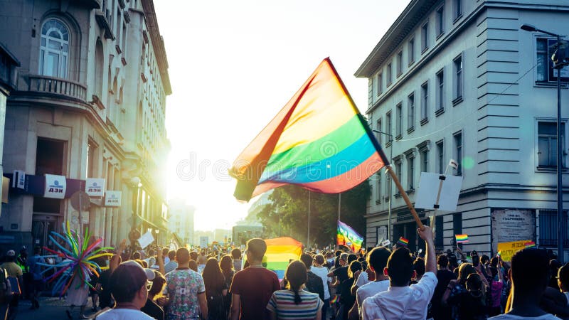 Thousands of people gathered to celebrate begining of LGBT Honor week. Participants wave rainbow flag and celebrate in the annual stock image Thousands of people gathered to celebrate begining of LGBT Honor week. Participants wave rainbow flag and celebrate in the annual stock image
