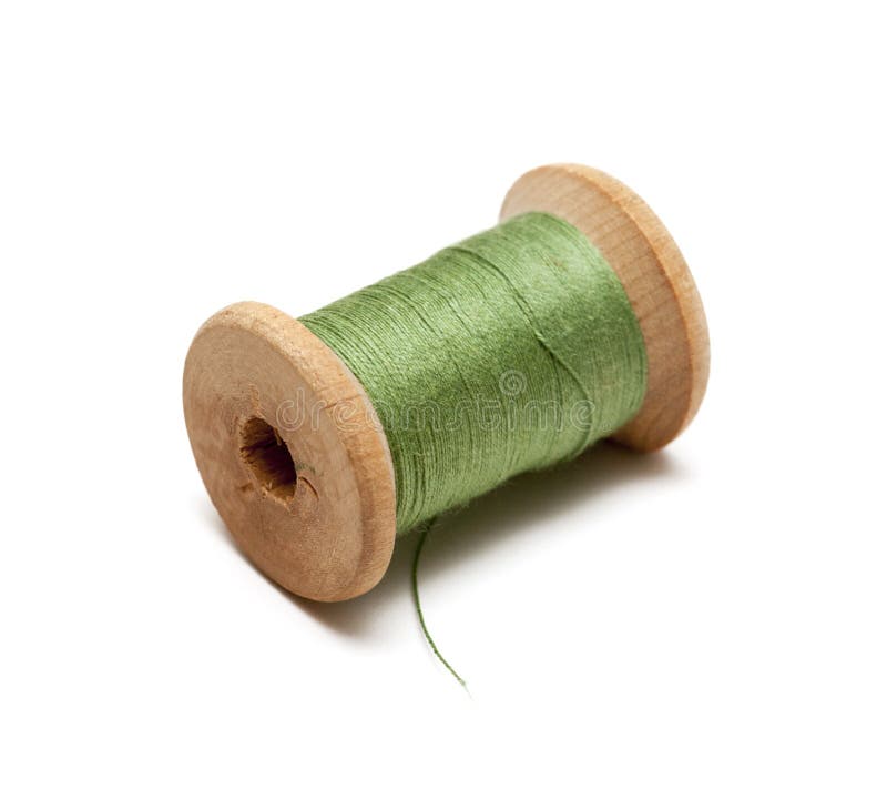 Thread bobbin on white background