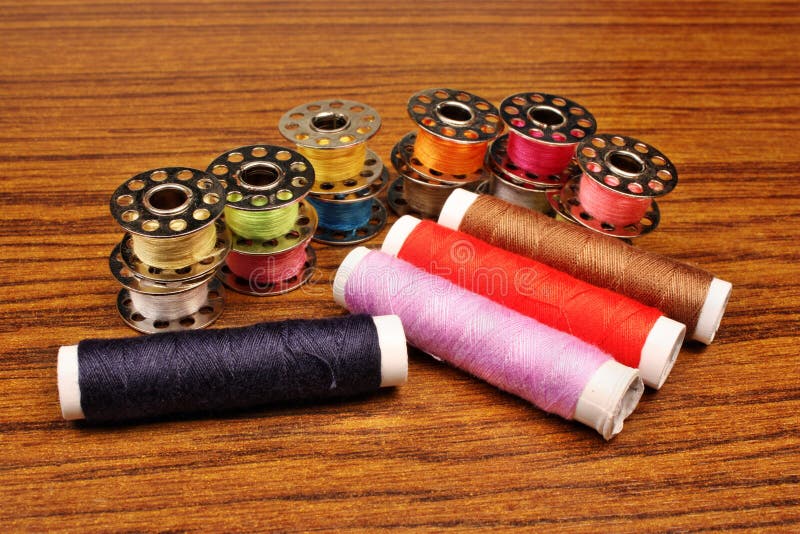 Thread a sewing machine stock image. Image of detail 33233781