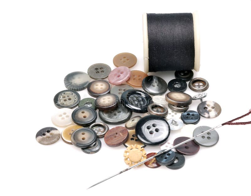 Thread spindles, buttons and needle