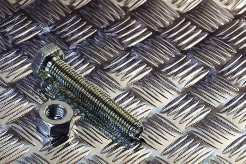 Threaded Hex Nut and Bolt on Tread Plate Stock Photo Image of close