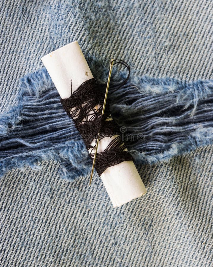 Threads and Needle on Jeans Backround Stock Image Image of backround