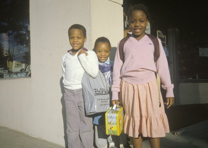 Three African-American elementary schoolchildren, Beverly Hills, CA stock photography Three African-American elementary schoolchildren, Beverly Hills, CA stock photography