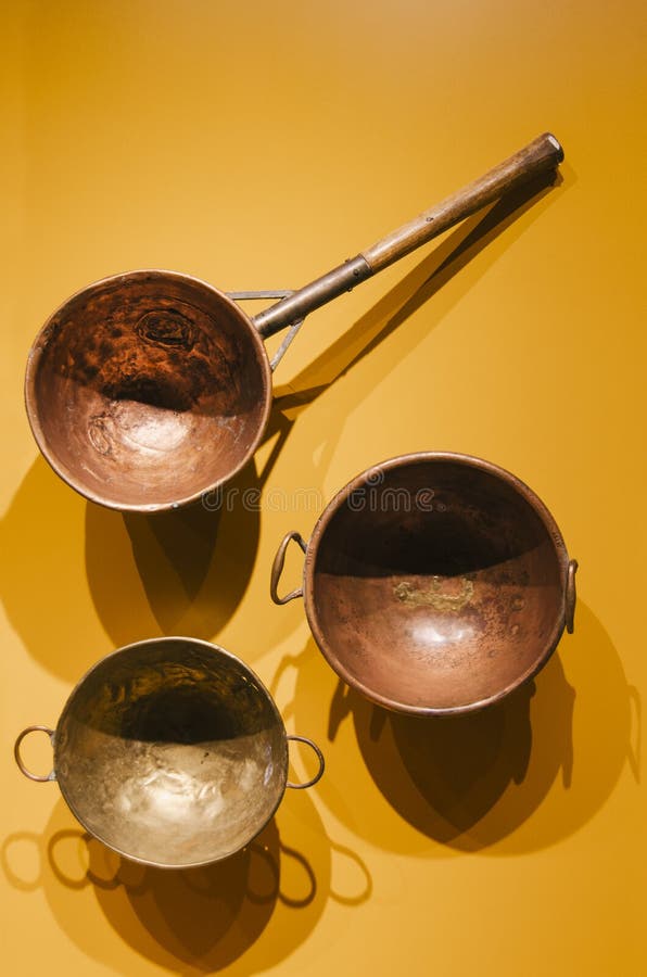 Three Antique Pan, Brass and Copper Holes Stock Photo Image of food