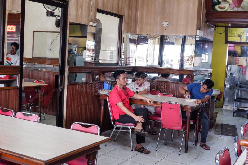 Jakarta, Indonesia - March 2022 : Several People are Having Luch on the