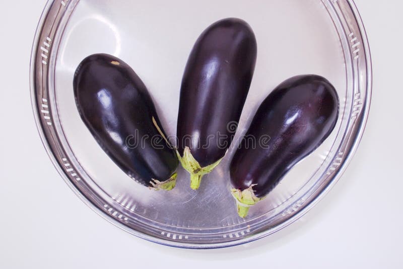 Three aubergines