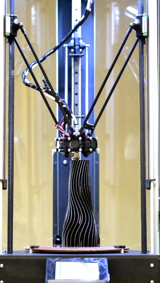 The three-axis 3d printer creates an object in the form of a black vase stock image