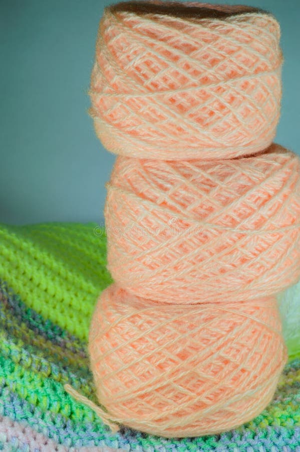 Three balls of pink yarn. stock photo. Image of crochet 84676160