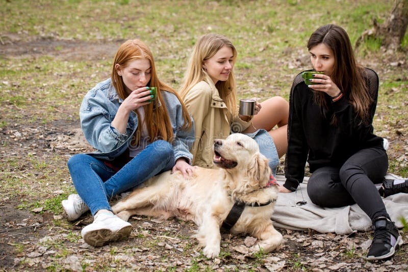 three-beautiful-young-women-drink-cocoa-three-young-beautiful-women-dog-drink-hot-cocoa-marshmallows-166224024.jpg