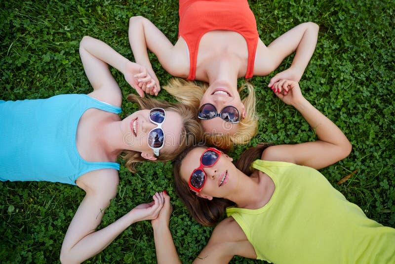 Three girls having fun outdoors stock image Three girls having fun outdoors stock image