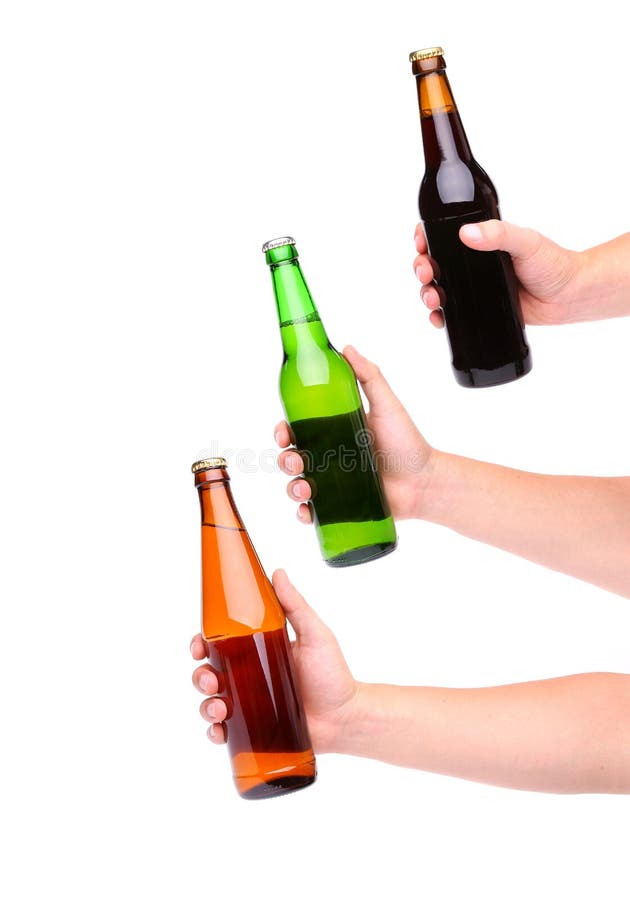 Three beer bottles and hands