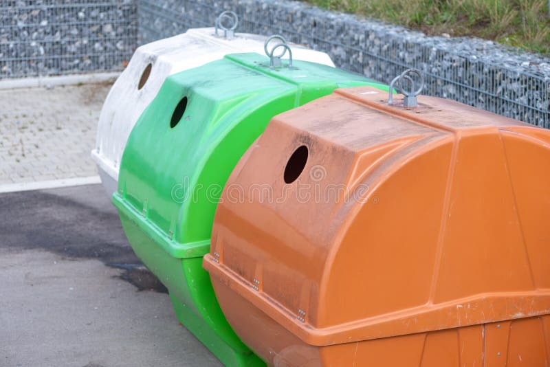 Containers in different colors to collect recyclable waste stock photo Containers in different colors to collect recyclable waste stock photo