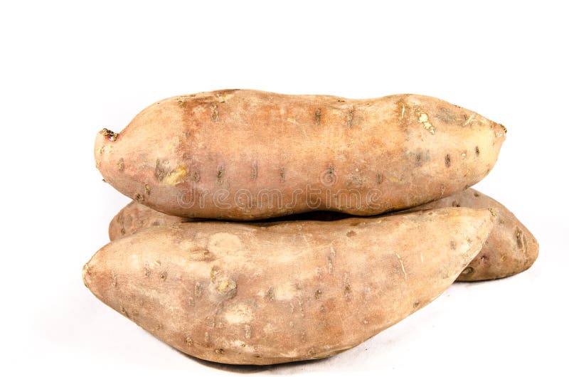 Three Big Sweet Potatoes Setting in a Stack Stock Image Image of sweet, greens 114445955