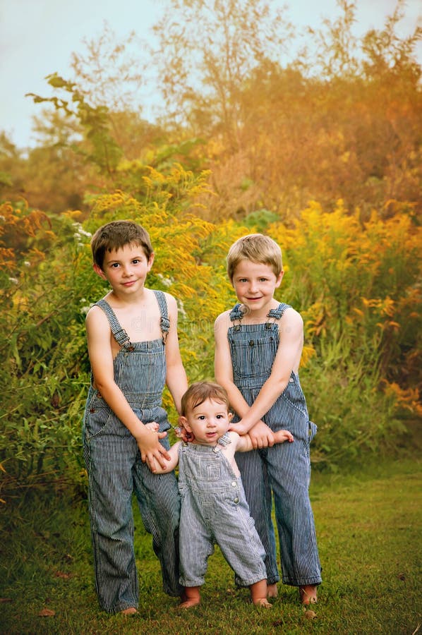 Three Boys Standing Autumn Portrait Stock Photo Image of standing