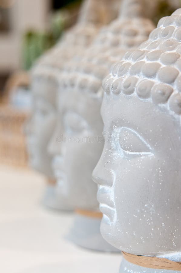 Three Buddha heads