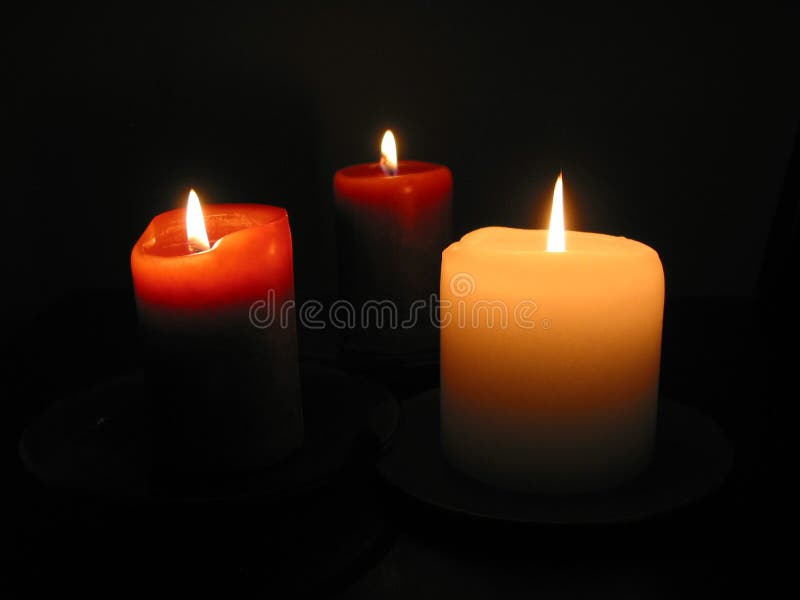 Three burning candles 1 stock image. Image of christmas - 378345