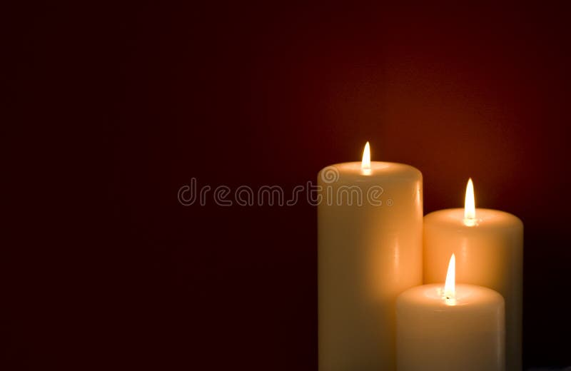 Three Candles Red Background