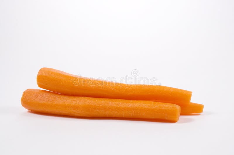 Three carrots on white