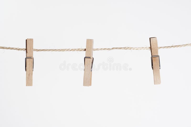 Three clamps for laundry hanging on a string