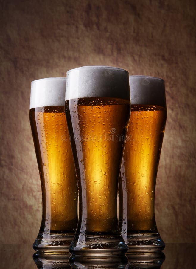 Three cold beer, isolated stock photo. Image of background 9585570