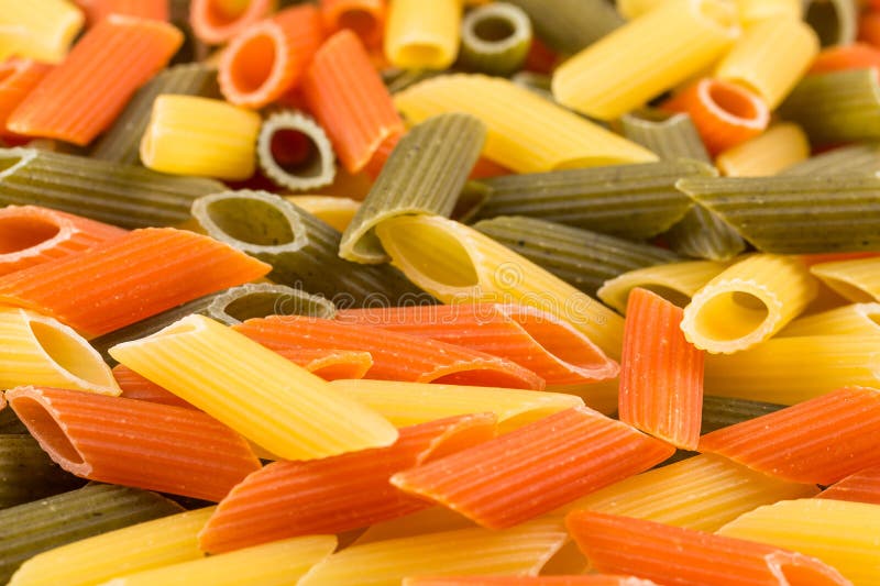 Three color penne pasta stock image. Image of uncooked 281636953