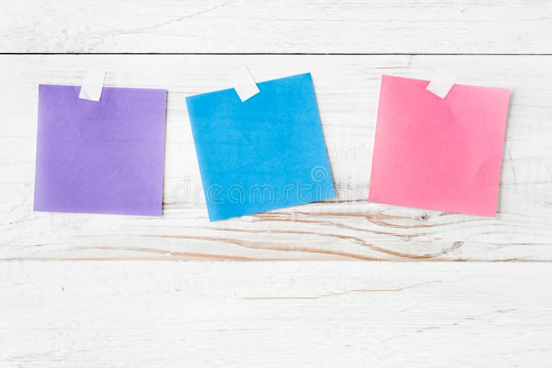 Three Colorful Pieces of Note Paper Waiting for a Message